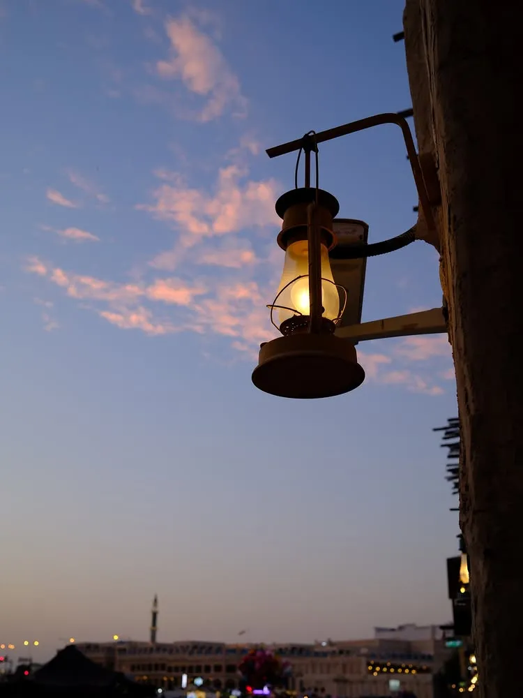 Lantern against sunset sky