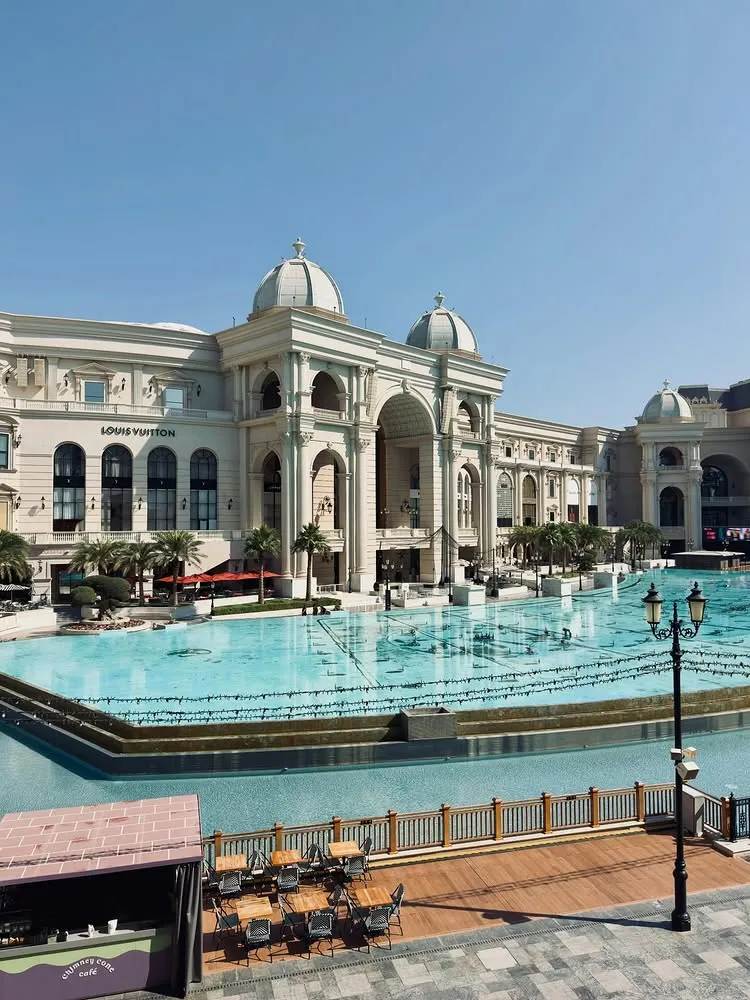 Ornate building with turquoise pool in Qatar